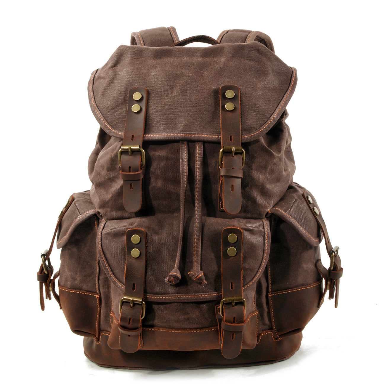 brown canvas leather backpack with leather flap and vintage rucksack design