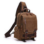brown canvas rucksack backpack with one shoulder strap
