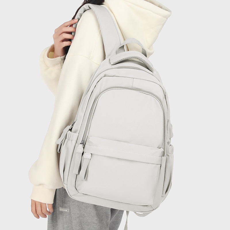 creamy white school backpack with custom design
