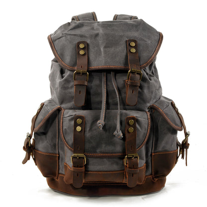 gray canvas leather backpack with classic outdoor travel design