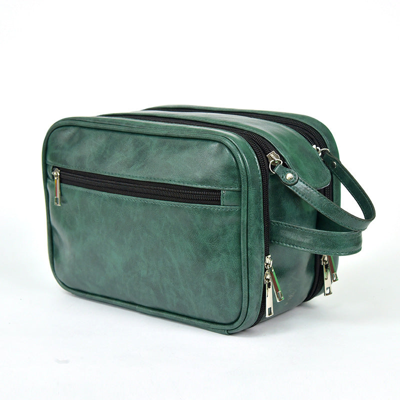 green pu leather travel toiletry bag with zipper compartments and handle