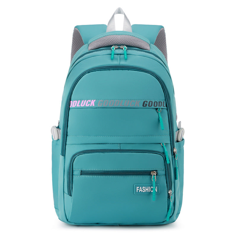 green school backpack front with large storage space for school and travel