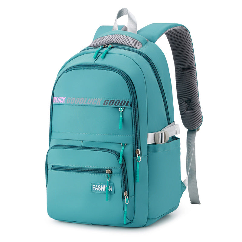 green school backpack with large storage space for school and travel