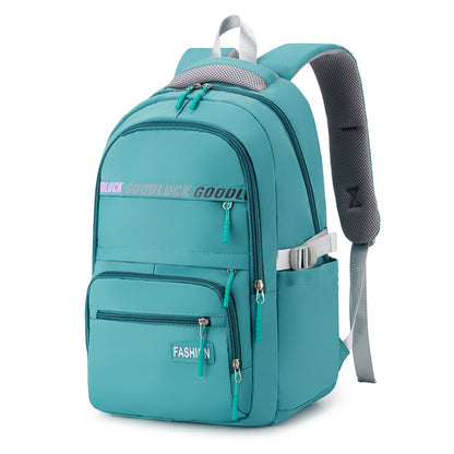 green school backpack with large storage space for school and travel