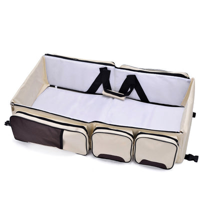 khaki diaper bag with changing station
