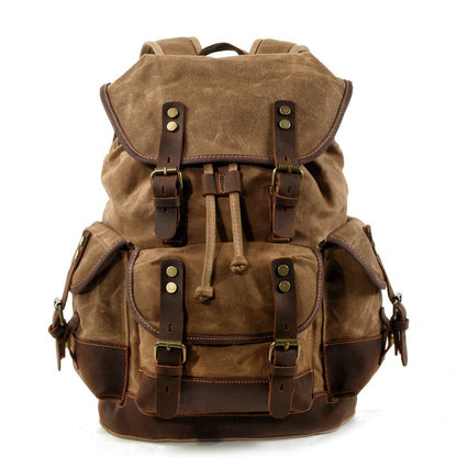 khaki washed canvas backpack with genuine leather details for travel and hiking