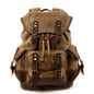 khaki washed canvas backpack with genuine leather details for travel and hiking