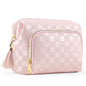pink leather cosmetic bag with checkerboard pattern and tassel decoration