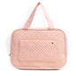 quilted travel makeup bag with handle for cosmetic storage and beauty essentials