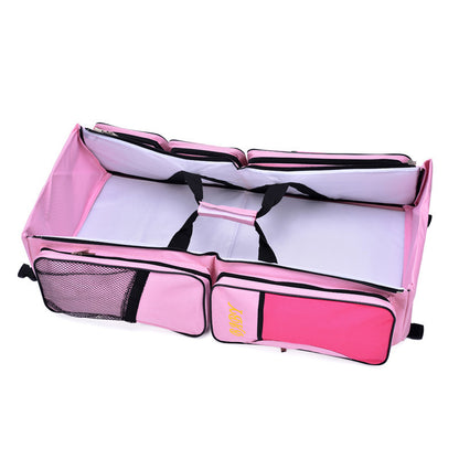rose red diaper bag with portable bassinet
