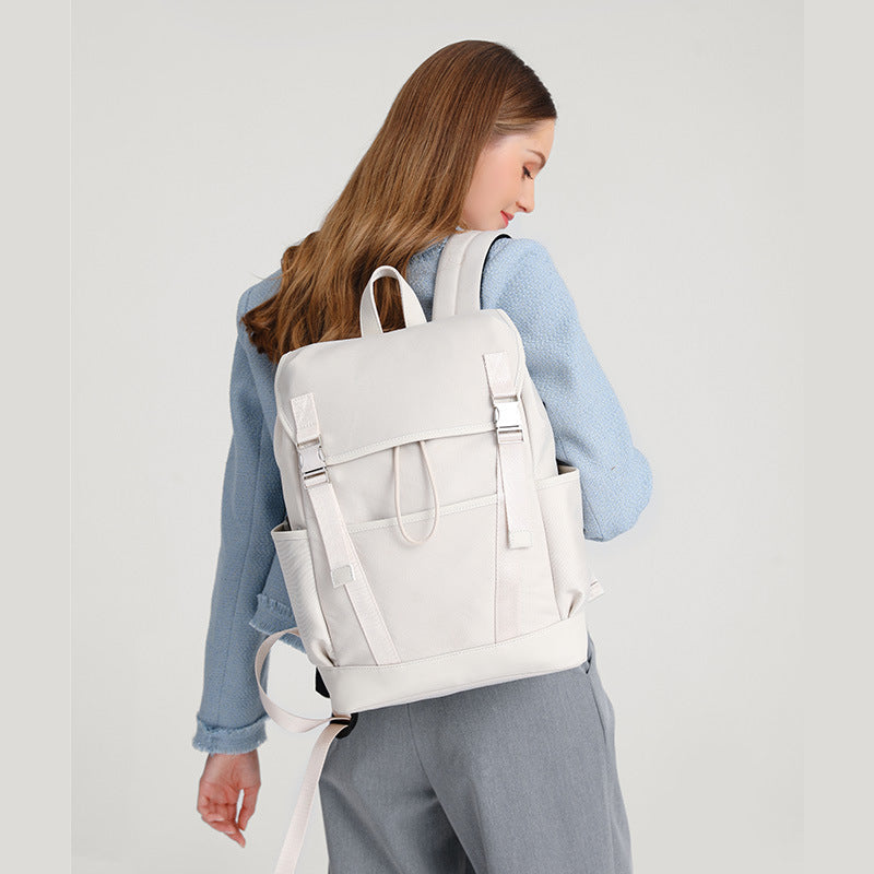 white drawstring backpack with adjustable shoulder straps