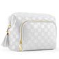 white leather cosmetic bag with checkerboard pattern and tassel decoration