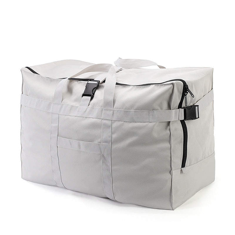 white oversized travel bag with reinforced carry handles adjustable side webbing and buckle straps